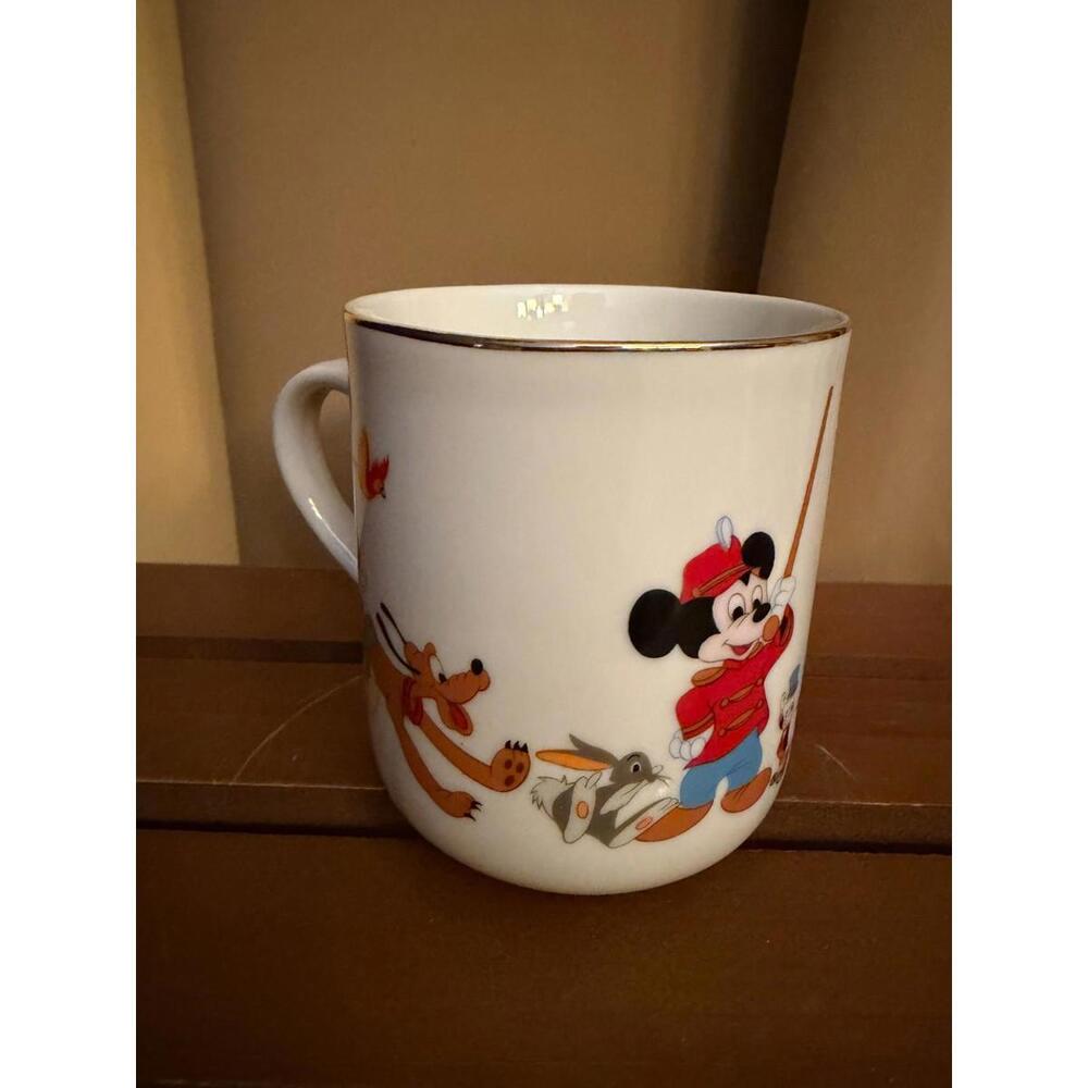 Walt Disney Gold Rimmed Mickey Mouse Parade Coffee/Tea Cup‎